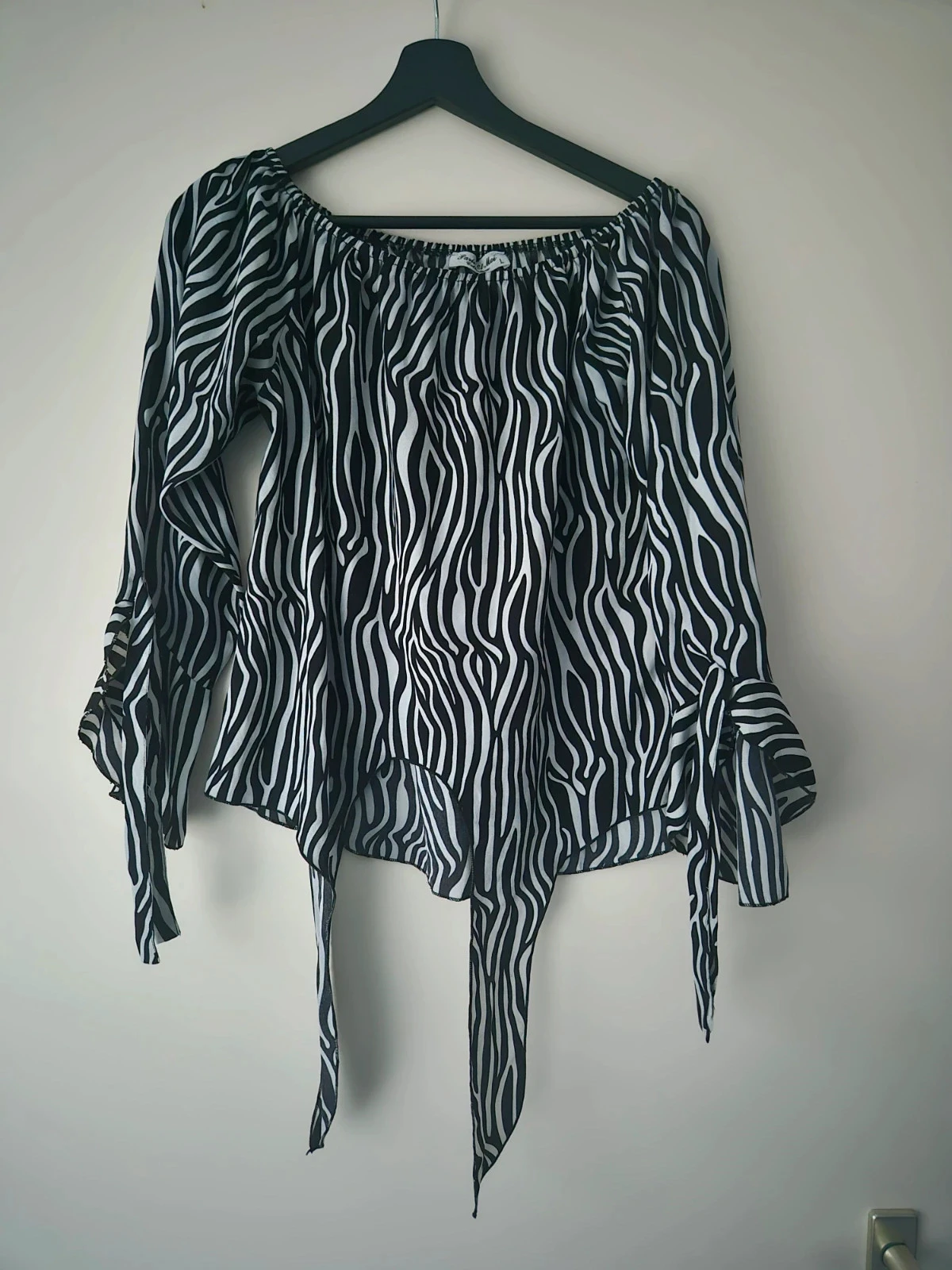 zebra print blouse maat L met strikdetail